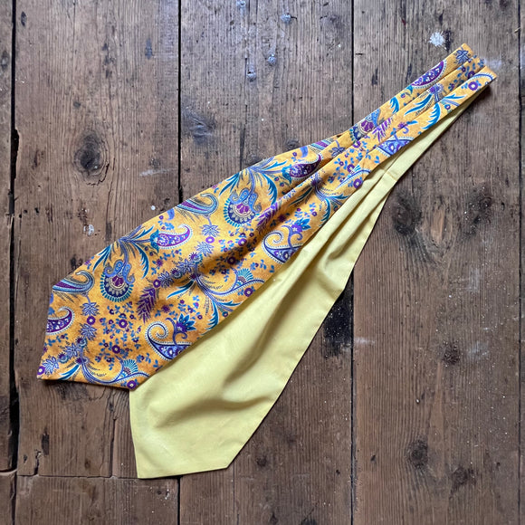 Yellow woollen cravat with purple paisley pattern