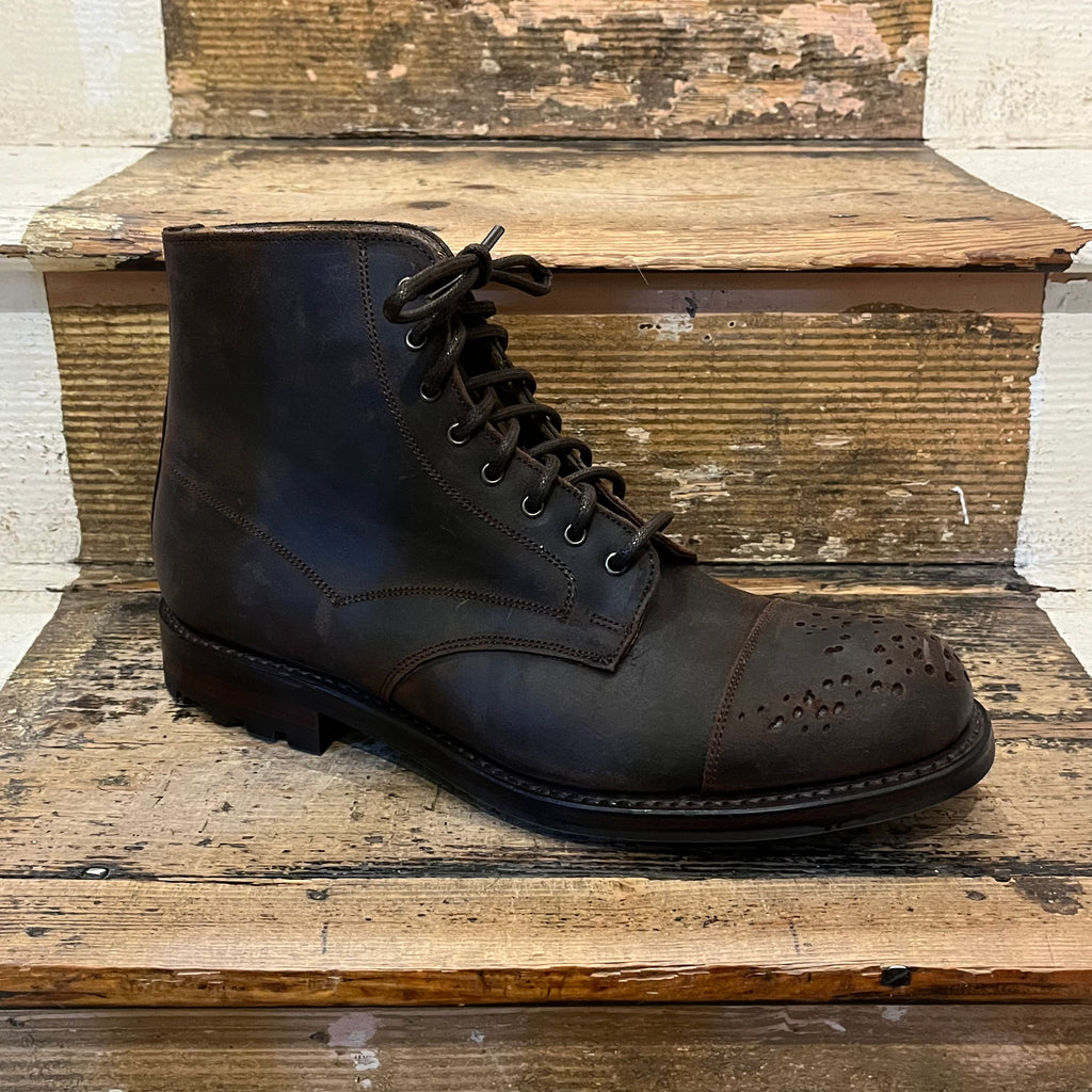 Waxed leather seven eyelet boot with gunshot broguing