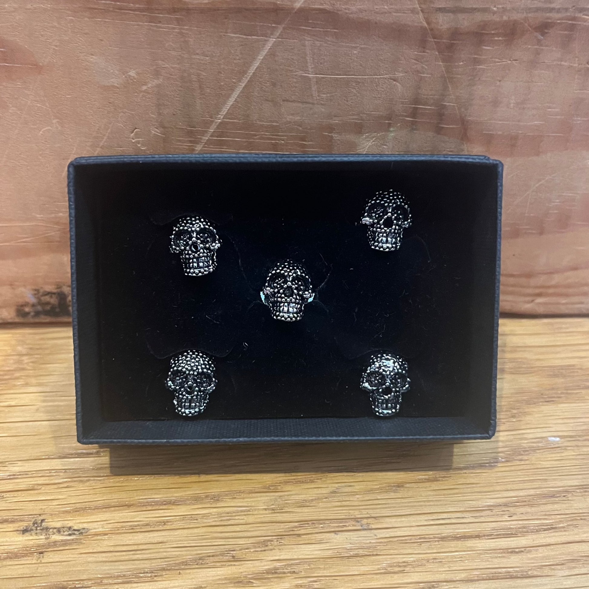 Set of five skull shirt studs
