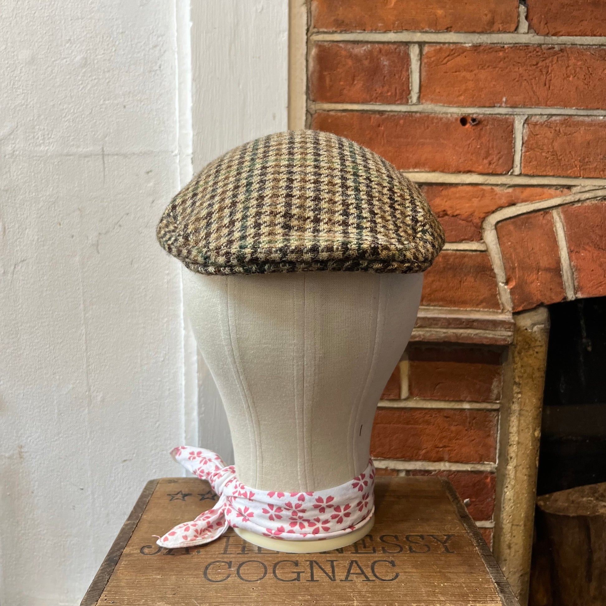 flat cap in brown beige and green houndstooth tweed