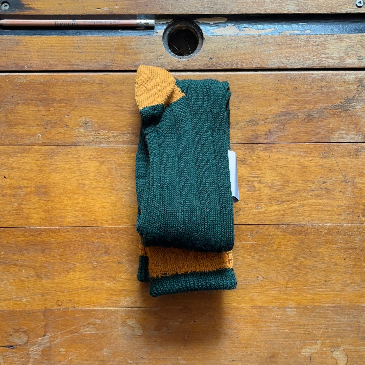 Racing green woollen boot sock with contrasting ginger heel