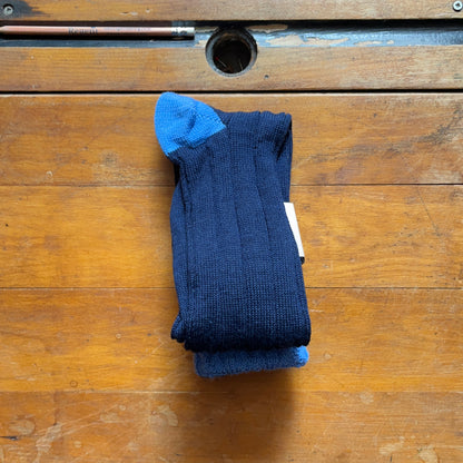 Navy blue woollen boot sock with contrasting baby blue heel