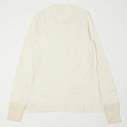 Beige long-sleeve shirt on a white background