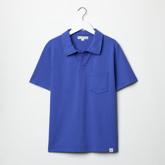 Blue single button polo shirt with patch chest pocket