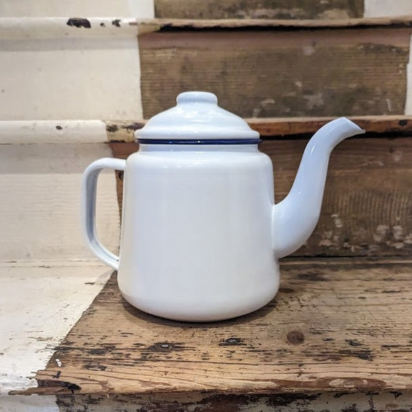 White enamel teapot with blue piping and lid traditional style.