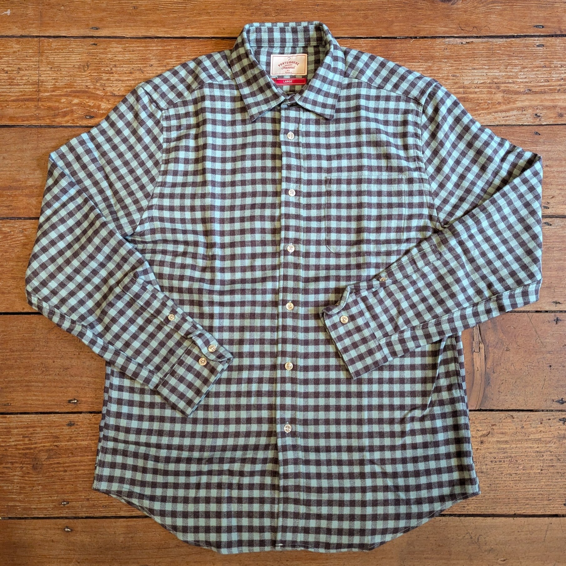 Green Brown check shirt with long sleeve button up cuff.