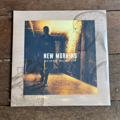 New morning album on wooden background