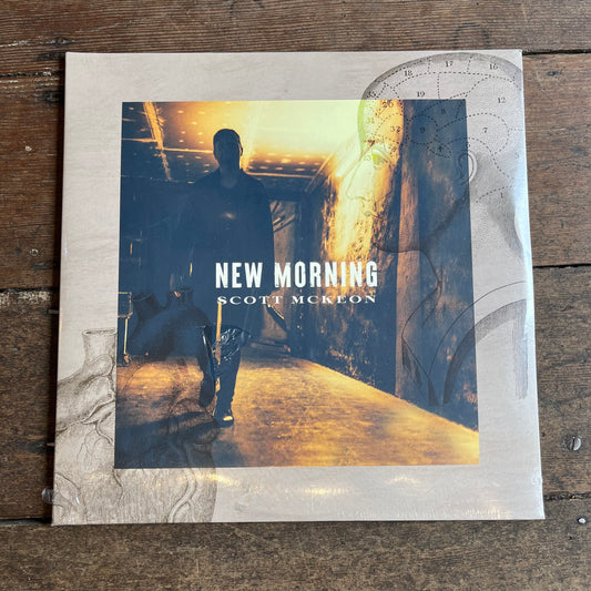 New morning album on wooden background