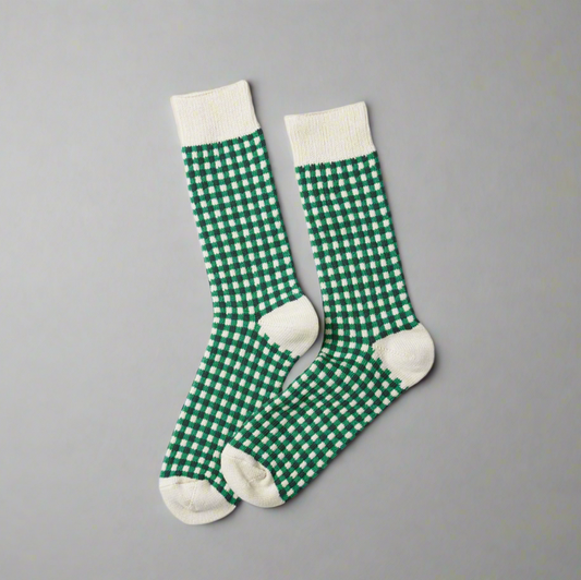 A pair of green gingham checked socks