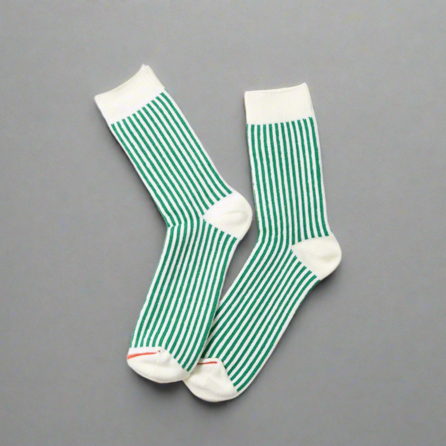 White rototo socks with vertical green stripes