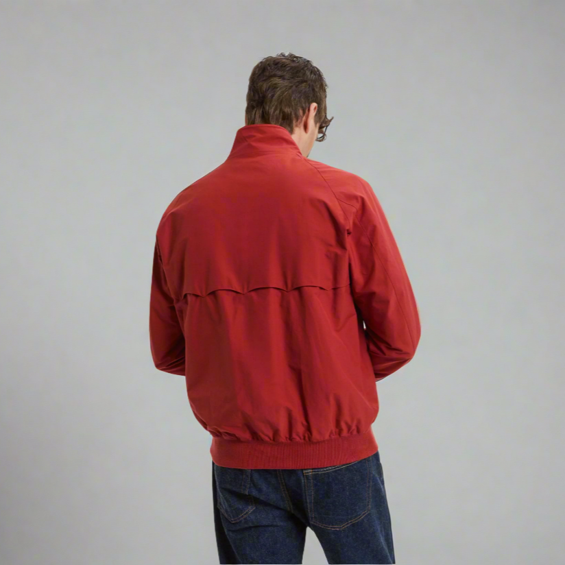 The back of a red jacket worn by a man