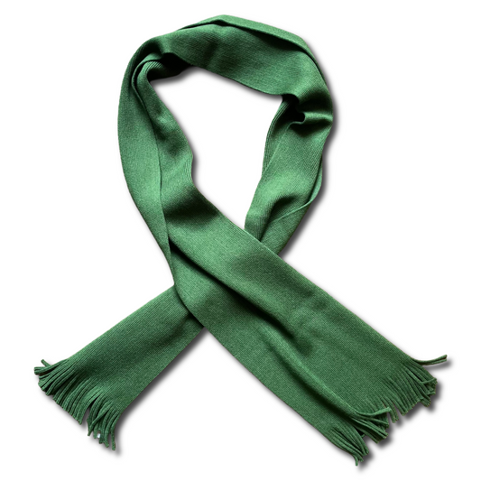 Green scarf with fringes on a white background