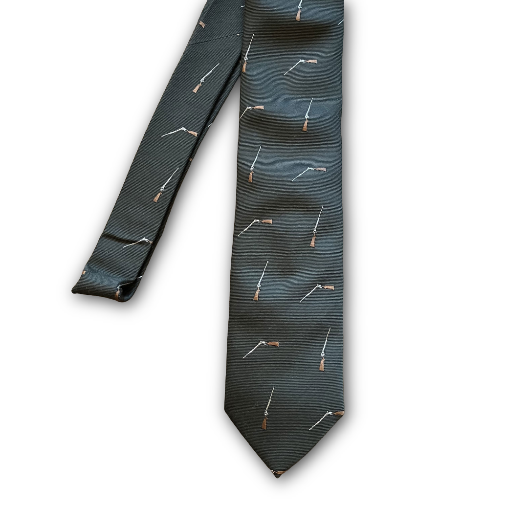 A khaki green necktie with a repeating pattern of miniature rifles in brown, white, and gray, displayed on a clean white background.