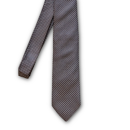A necktie with a brown base and a dense pattern of small white dots, shown against a plain white background.
