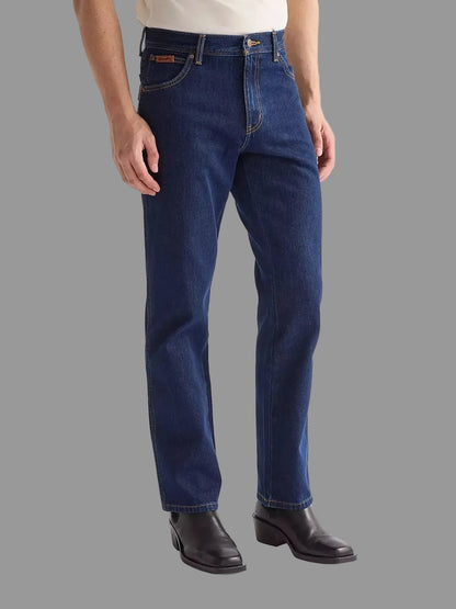 Person wearing Wrangler Straight blue Darkstone jeans - available at Regent Tailoring Salisbury UK