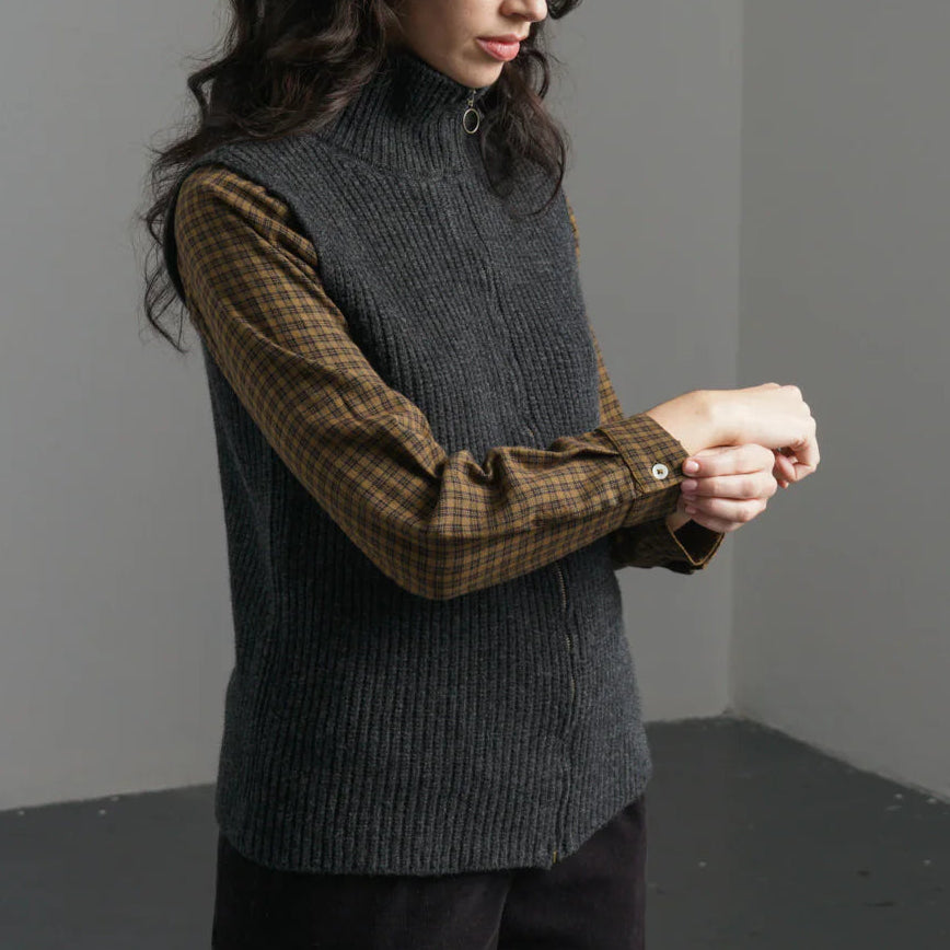 Dark gray knitted vest, 100% wool and zip details. available at Regent Tailoring Salisbury UK 