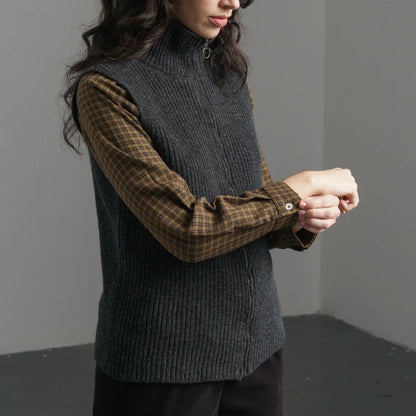 Dark gray knitted vest, 100% wool and zip details. available at Regent Tailoring Salisbury UK 