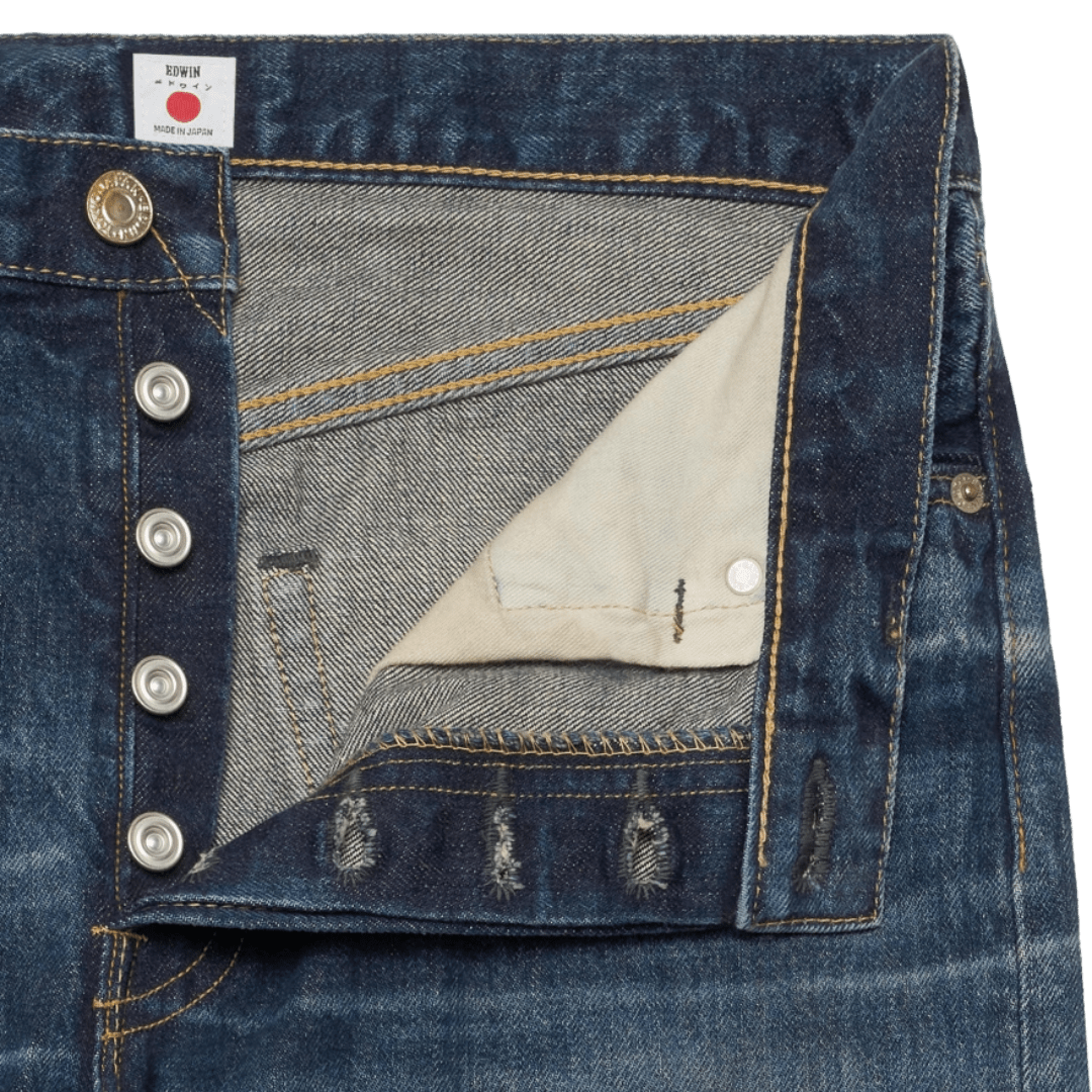 EDWIN Regular Straight Jeans in Blue Dark Used. Japanese 13.5oz Kaihara selvedge denim with a high rise, straight fit and authentic worn-in finish.