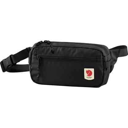 black fjallraven hip pack with fron zip and padding on the inside.