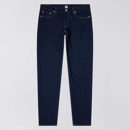 Navy blue jeans on a light gray background