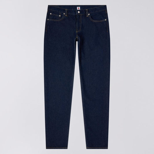 Navy blue jeans on a light gray background