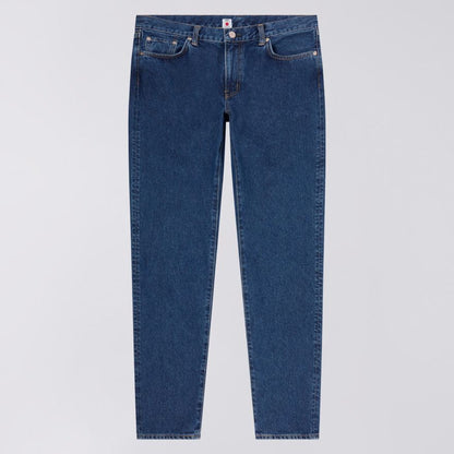 Blue jeans on a light gray background