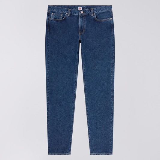 Blue jeans on a light gray background