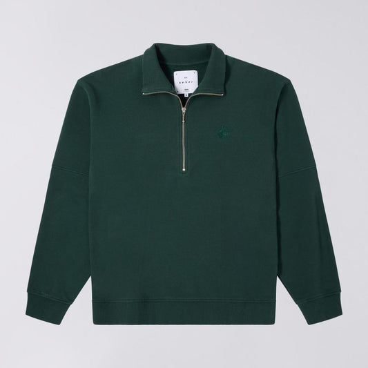 Green pullover with a zipper on a light gray background
