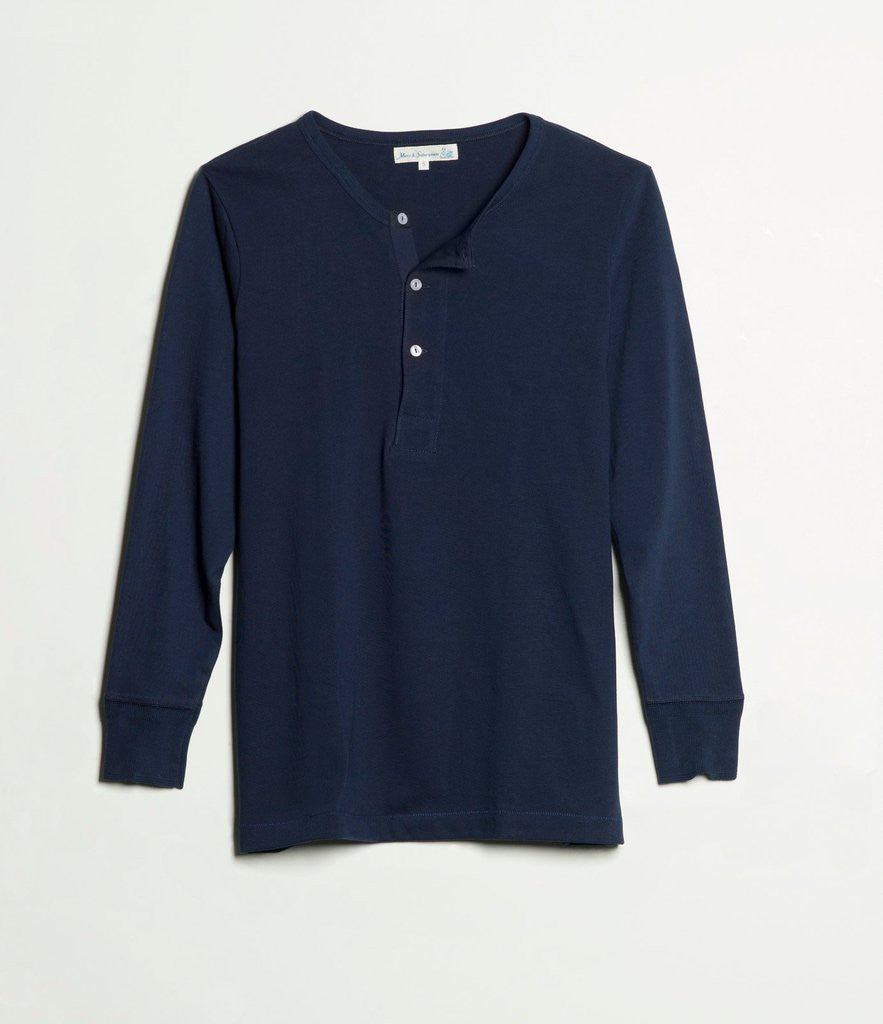 Navy long-sleeve shirt on a light gray background