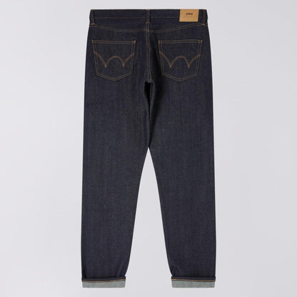 Dark blue jeans on a light gray background