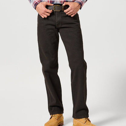 Person wearing a plaid shirt, black pants, and tan shoes on a white background