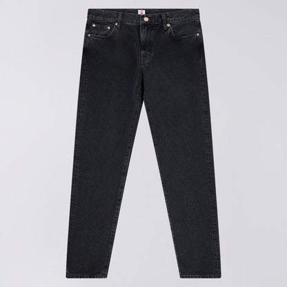 Black jeans on a light gray background