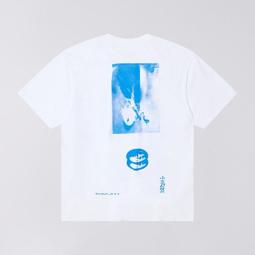 White t-shirt with blue graphic design on a light gray background