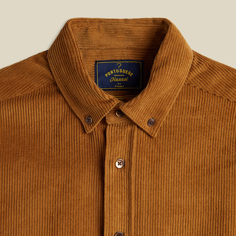 Collar of burnt orange shirt