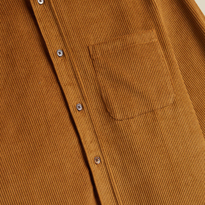 Pocket of burnt orange shirt