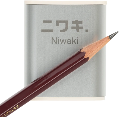 Niwaki pencil with a silver case on a white background