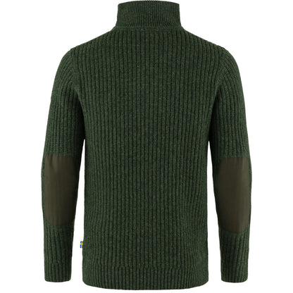 Green ribbed sweater with dark green patch on sleeves against a white background