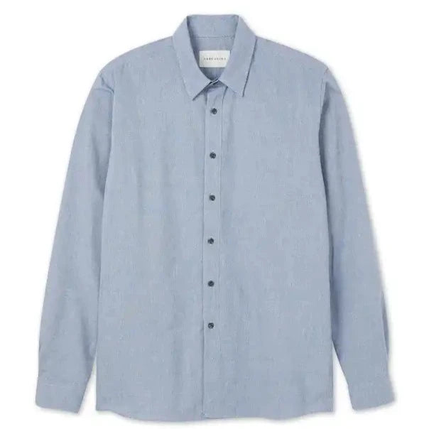 Peregrine shirt ocean blue. open collar complimentary blue buttons