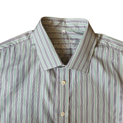 A close-up of a Regent striped shirt collar with vertical stripes in grey, green, and white