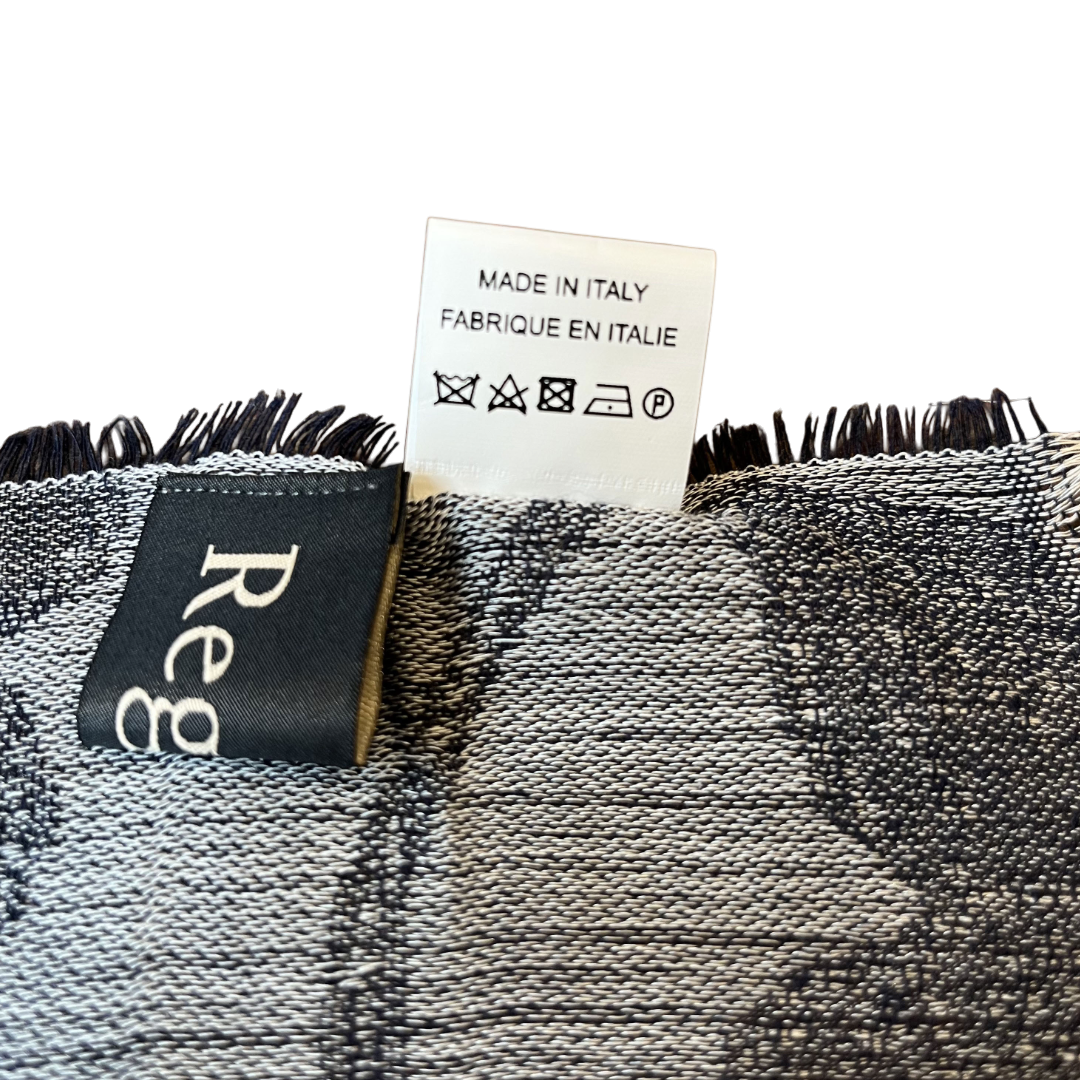 Regent Tailoring floral textured lightweight scarf showing the Made in Italy fabric care label and brand tag.
