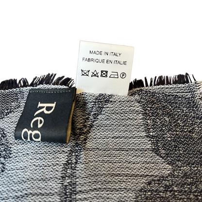 Regent Tailoring floral textured lightweight scarf showing the Made in Italy fabric care label and brand tag.