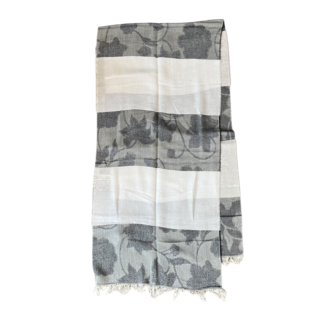Regent Tailoring lightweight scarf in grey and white with a floral textured pattern and fringed edges.