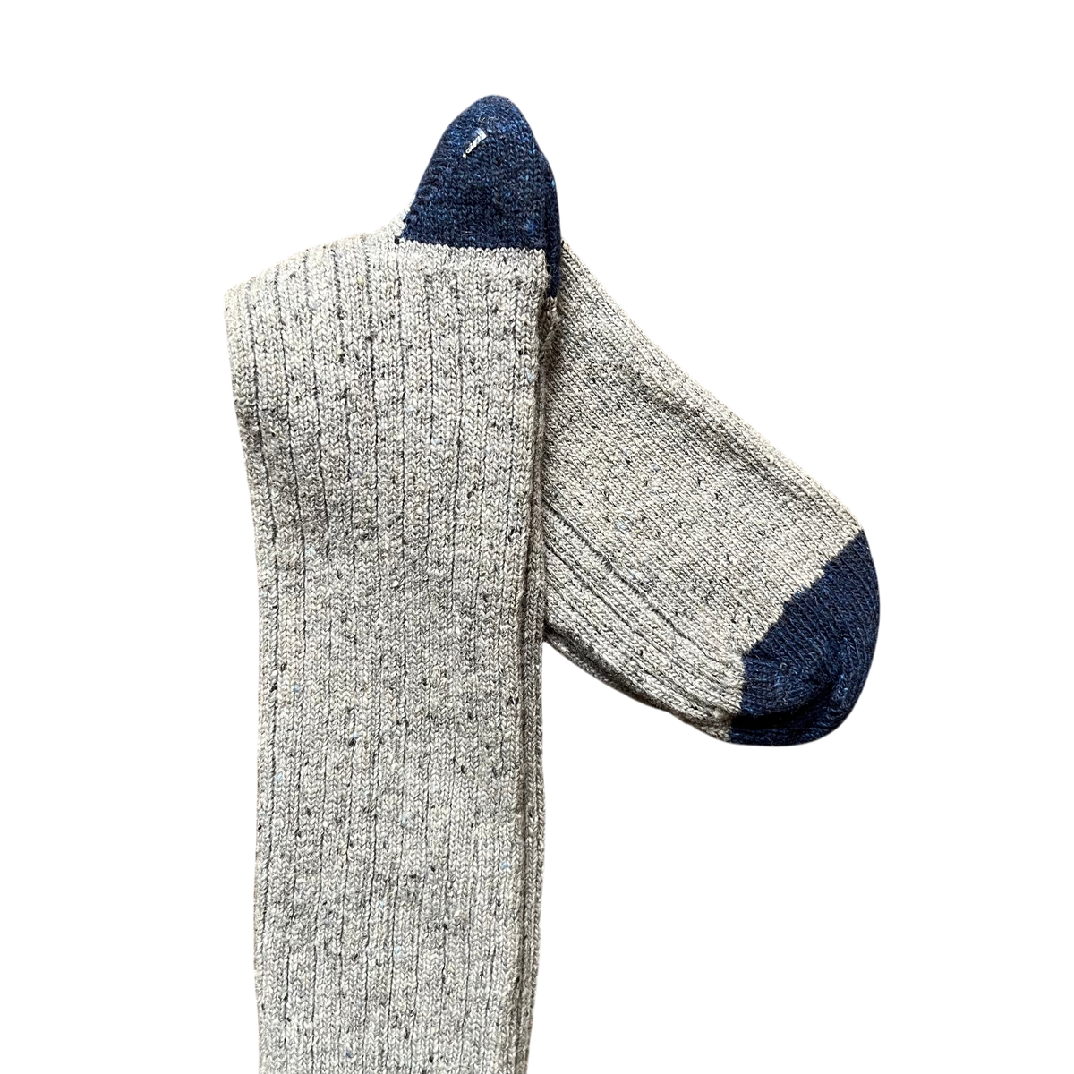 Regent Tailoring grey merino wool blend boot socks with navy blue toe and heel detail on a rustic wooden floor.
