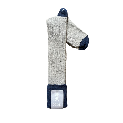 Regent Tailoring grey and navy merino wool blend boot socks with ribbed texture on a rustic wooden floor