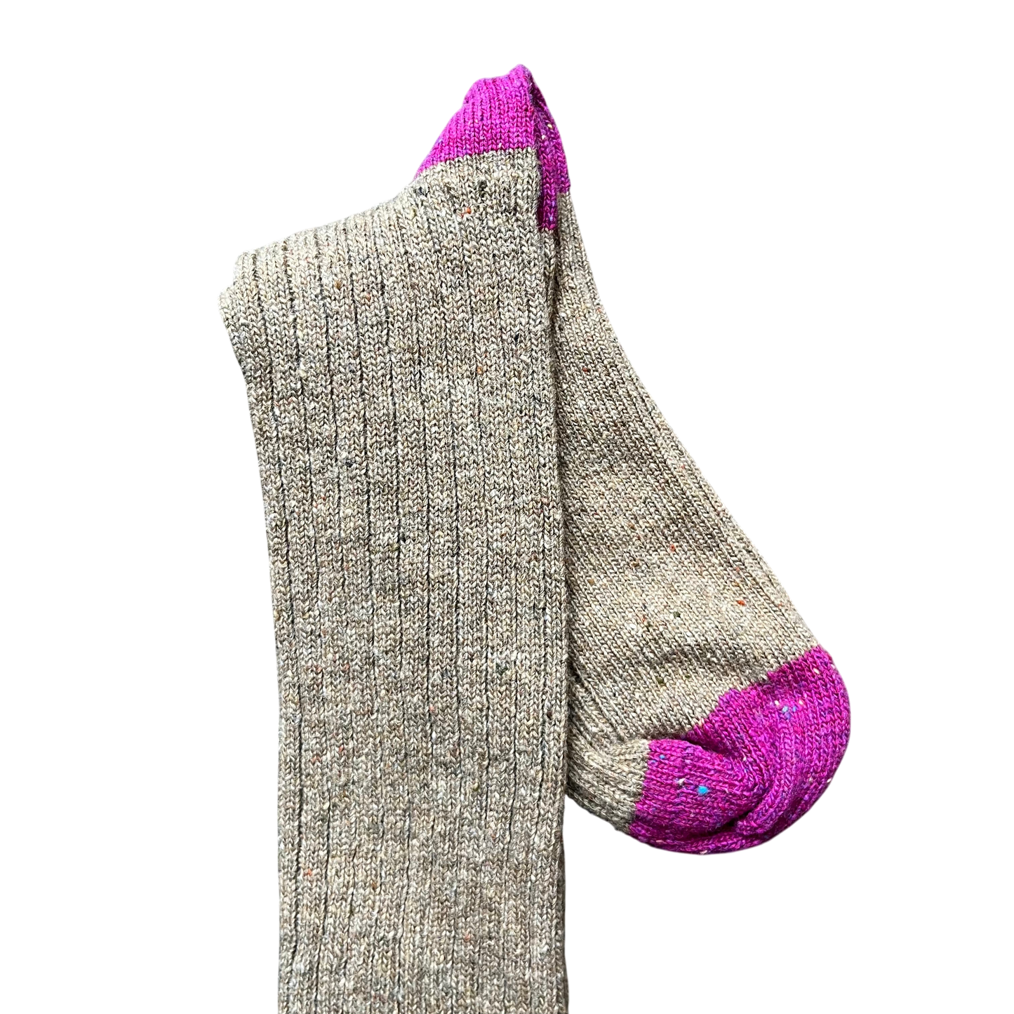 Regent Tailoring merino wool boot socks in beige with vibrant pink toe and heel contrast on a rustic wooden floor.