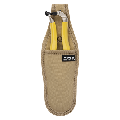 Regent Tailoring Niwaki Daikiba secateurs with yellow handles stored in a durable beige canvas holster