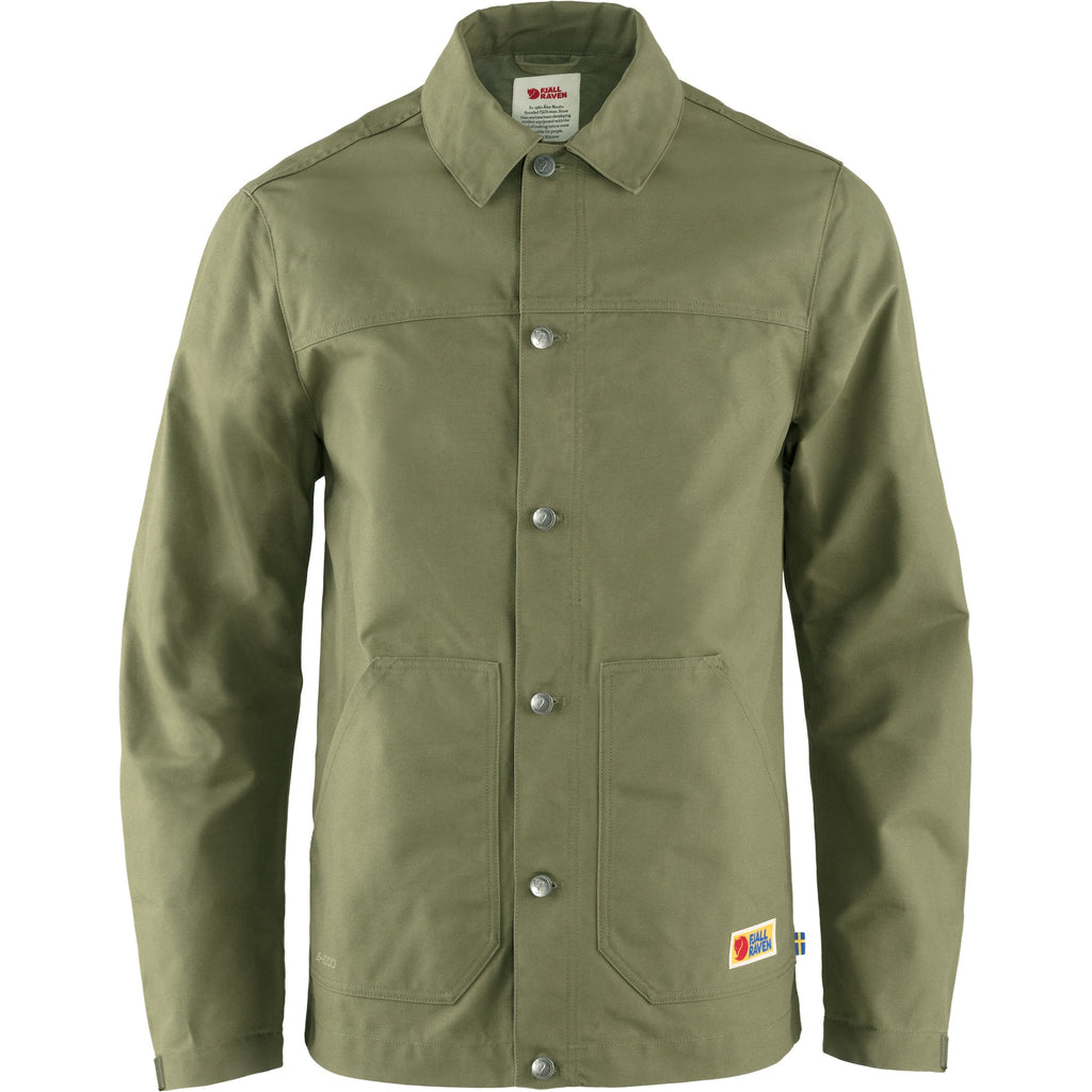 Vardag in green popper shut jacket with collar and two lower pockets.