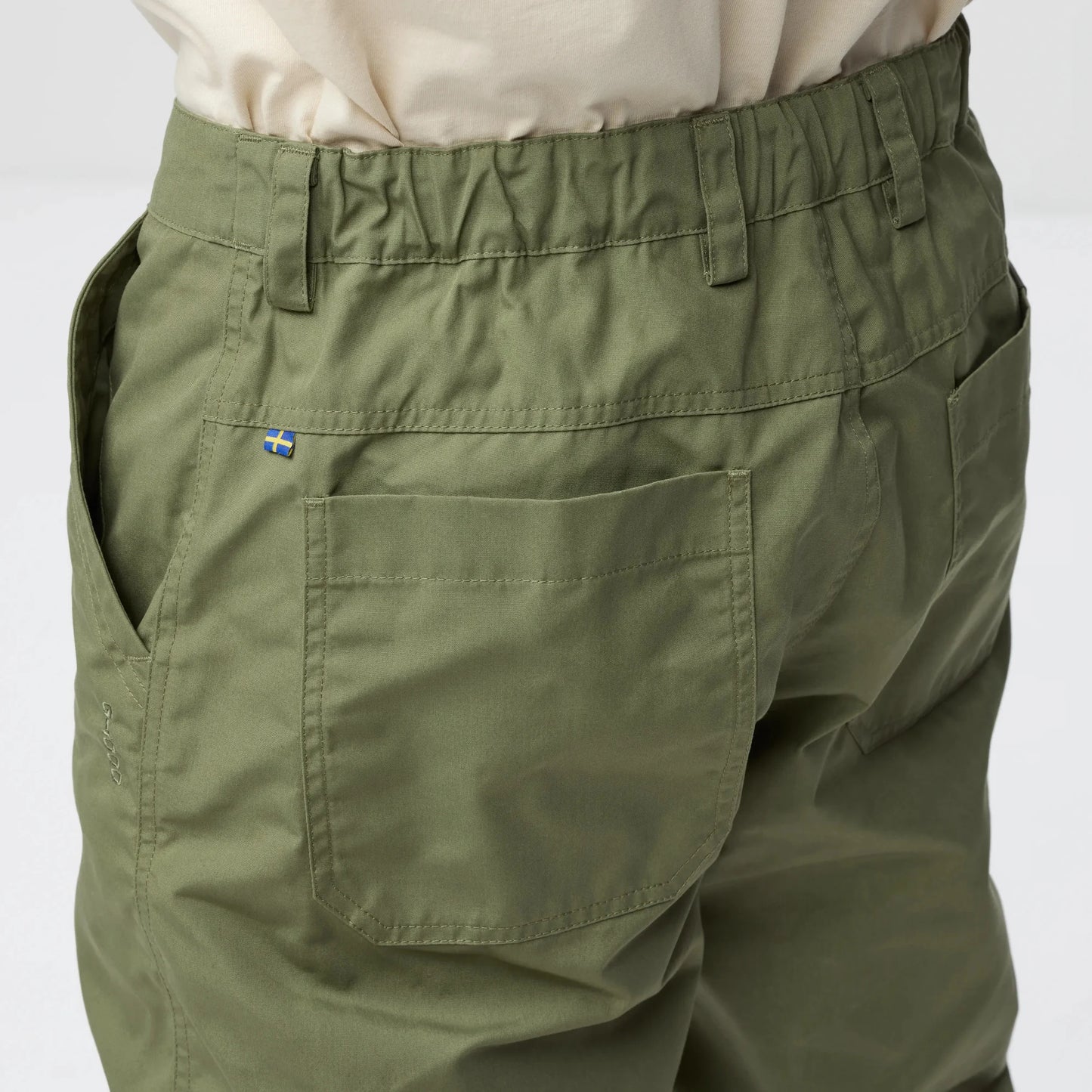 Green pants with a brand logo with elasticated waist 