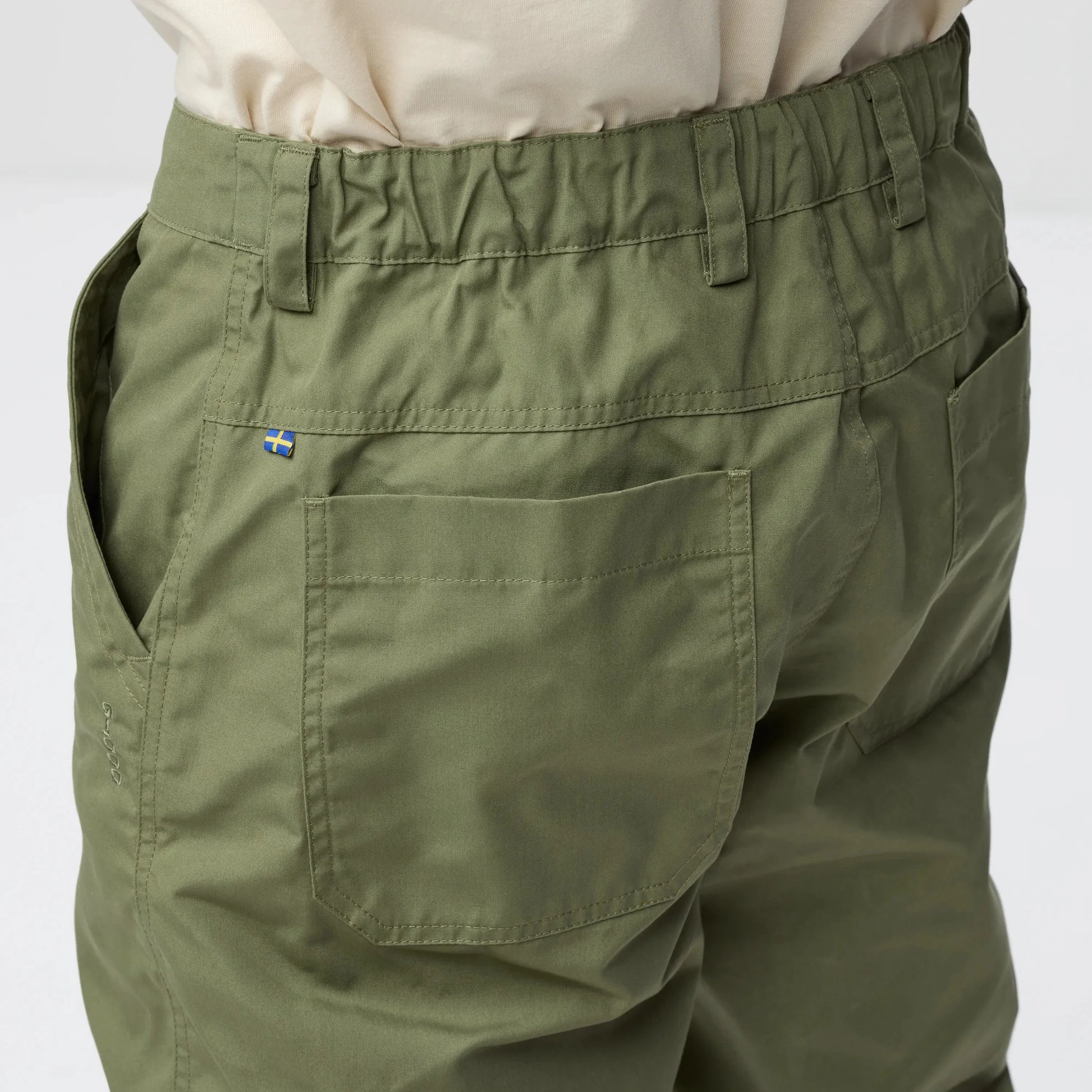 Green pants with a brand logo with elasticated waist 