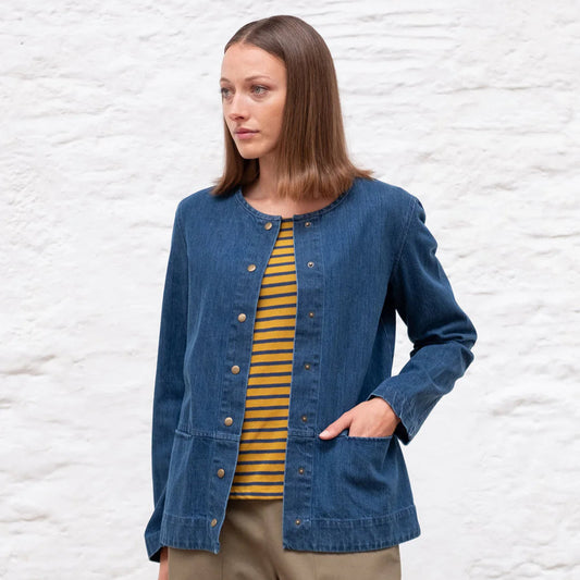 Denim jacket with crew collar and popper closure. patch pockets on hem.